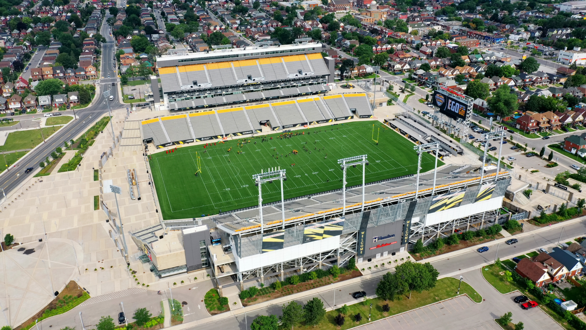 Aerial view of Tim Hortons Field in Hamilton, illustrating the football stadium and its surrounding landscape.