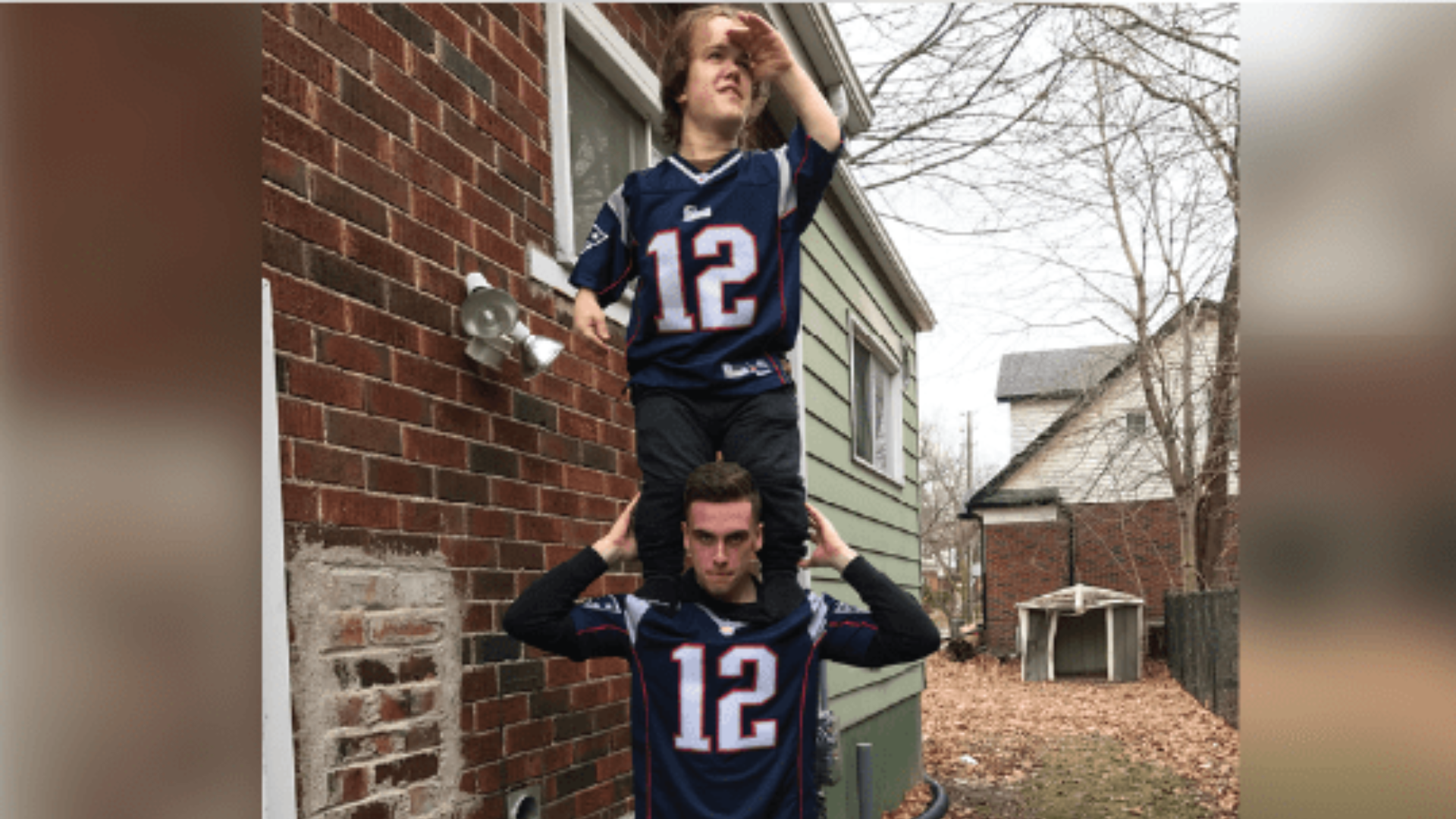 Connor Carroll lifts John Ferguson on his shoulders, showcasing their bond as Amazing Race participants.