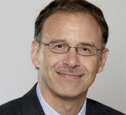 Headshot of Ronald Balvers, smiling.