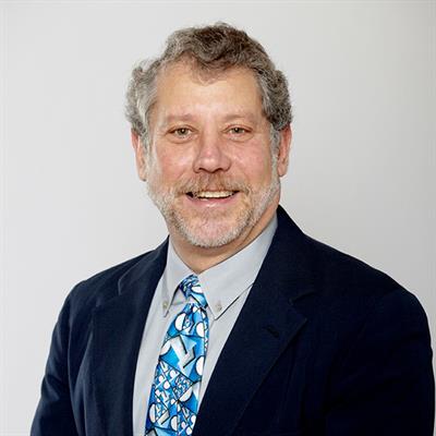 Headshot of Benson Honig, smiling.