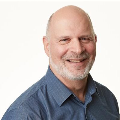 Headshot of Christopher Longo, smiling.