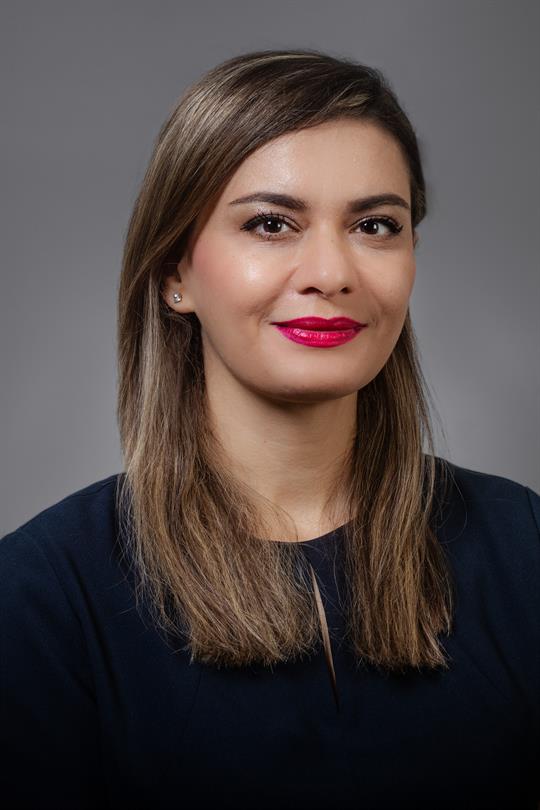 Headshot of Maryam Ghasemaghaei, smiling.