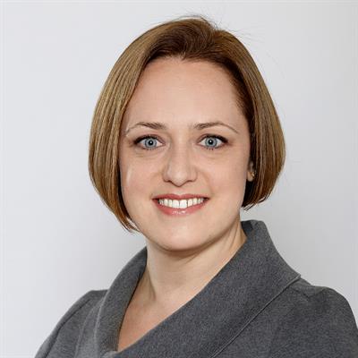 Headshot of Nicole Wagner, smiling.