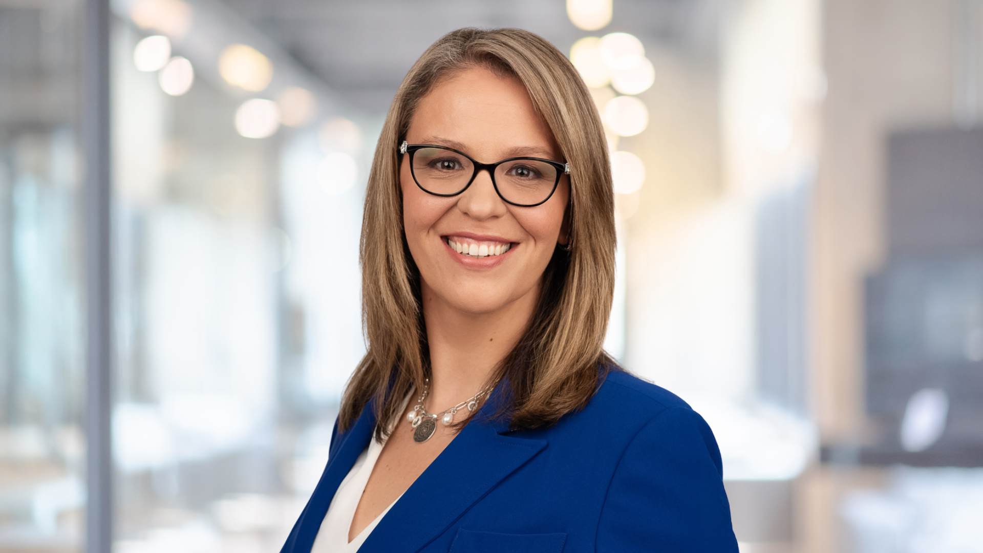 Headshot of Meaghan Stovel McKnight, smiling.