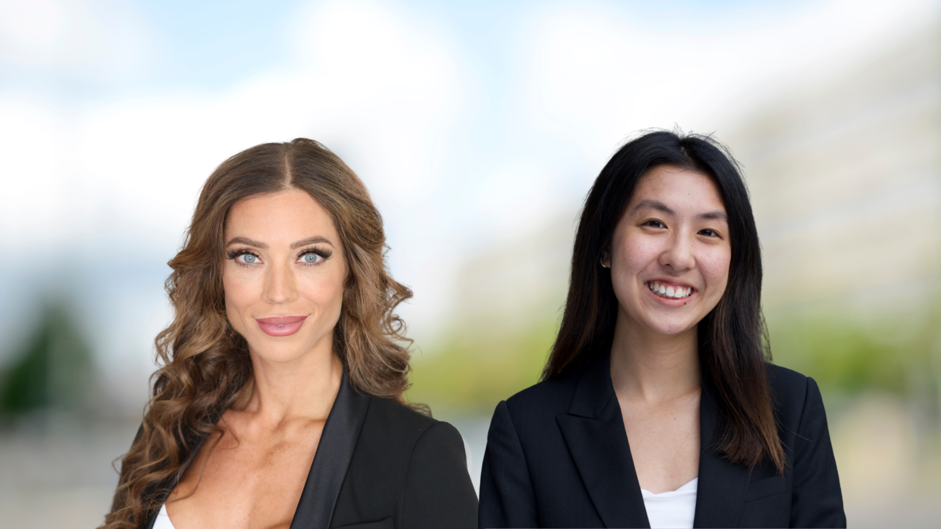 Nicole Rakowski and Julia Vo, dressed in professional attire, are both beaming at the camera.