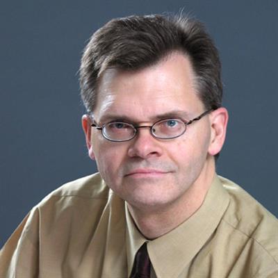 Headshot of Dr. Richard Deaves, smiling.