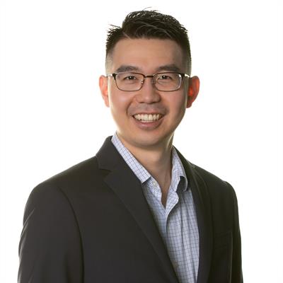 Headshot of Dr. Chris Ling, smiling.
