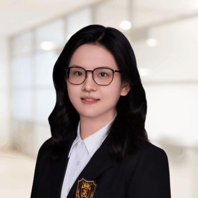 Headshot of Runqi Wang, a smiling woman with long, dark hair, wearing glasses and a dark blazer.